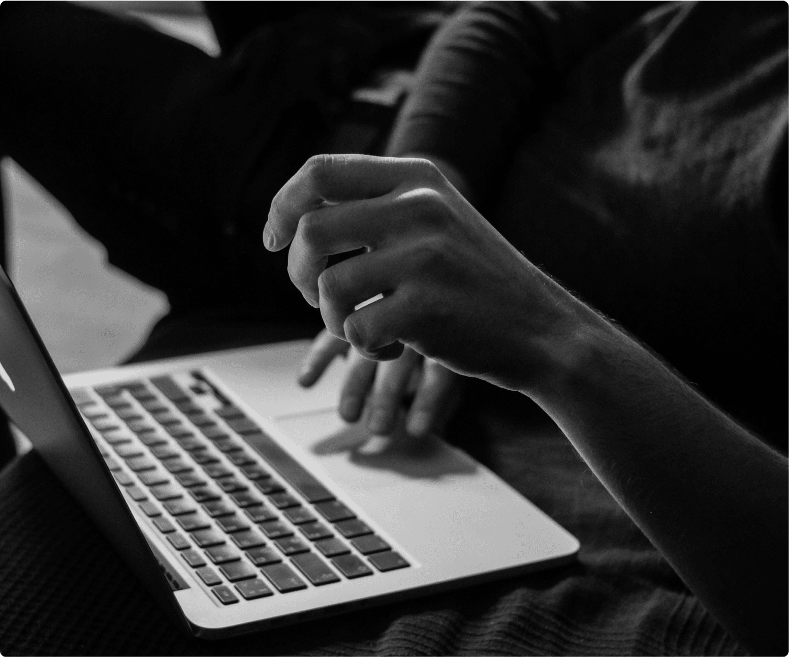 hands and a laptop